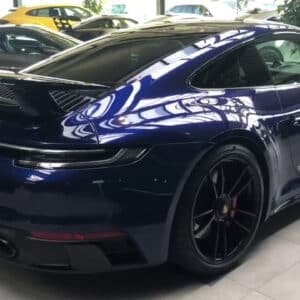 Porsche 911 type 992 GTS Coupé Aerokit 2023 bleu gentiane