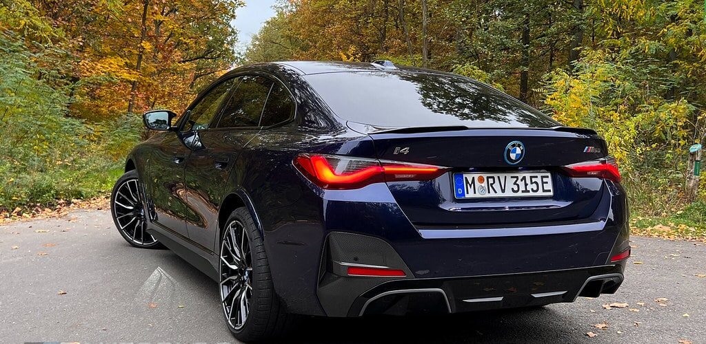 BMW I4 occasion Allemagne bleu nuit face arrière