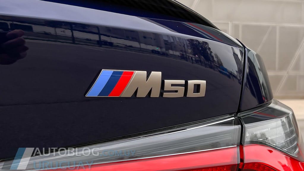 BMW I4 occasion Allemagne bleu nuit face arrière sigle M50